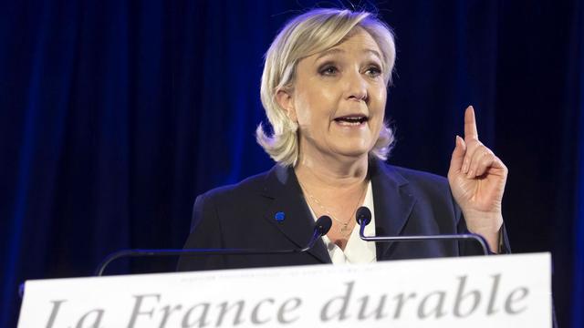 Le programme de Marine Le Pen influe sur les cours de l'euro. [EPA/Keystone - Ian Langsdon]