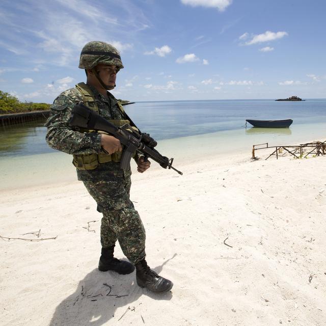 Un soldat philippin sur l'île de Thitu, la plus grande de l'archipel des Spratleys, source rivalités en mer de Chine méridionale. [AFP - Ritchie B. Tongo]