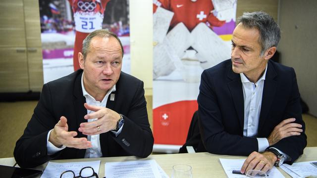 Le président de Swiss Olympic Jürg Stahl et son directeur Roger Schnegg (de g. à dr.). [Keystone - Laurent Gillieron]
