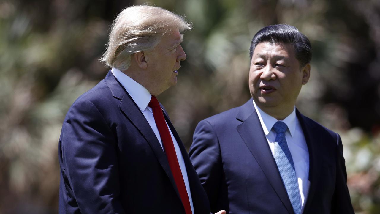 Les présidents américain Donald Trump et chinois Xi Jinping, le 7 avril à Mar-a-Lago à Palm Beach en Floride. [Alex Brandon]