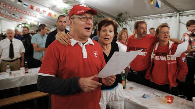 La Société suisse d'utilité publique veut propager le nouvel hymne national dans les communes. [Keystone - Peter Klaunzer]