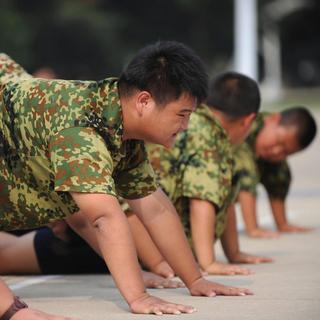 Des camps d'amaigrissement estivaux sont organisés dans toute la Chine en raison de la progression de l'obésité chez les jeunes. [EPA/Keystone]