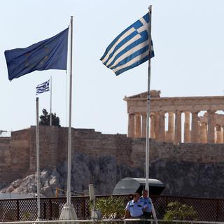 Les intérêts du remboursement de la dette grecque ont rapporté près de 9 milliards de francs aux Banques Centrales européennes. [AP/Keystone - Thanassis Stavrakis]