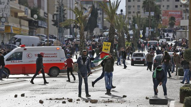 Des heurts ont éclaté à Ramallah en Cisjordanie après la décision de Donald Trump sur Jérusalem. [AFP - Abbas Momani]