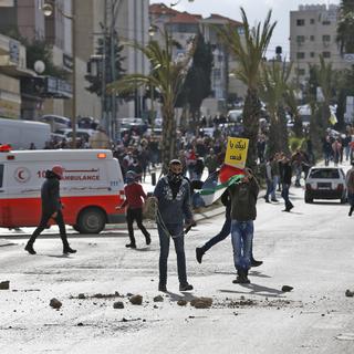 Des heurts ont éclaté à Ramallah en Cisjordanie après la décision de Donald Trump sur Jérusalem. [AFP - Abbas Momani]