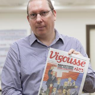 Stephane Babey, rédacteur en chef de Vigousse, pose en janvier 2016. [Keystone - Cyril Zingaro]