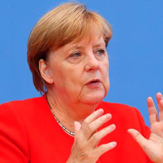 La chancelière allemande Angela Merkel, mardi, lors de sa conférence presse. [Reuters - Fabrizio Bensch]