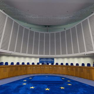 L'intérieur de la Cour européenne des droits de l'homme à Strasbourg. [Keystone - Patrick Seeger]