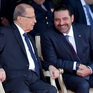 Le président libanais Michel Aoun et le Premier ministre Saad Hariri ont assisté aux célébrations de la fête de l'indépendance à Beyrouth. [Keystone - EPA/Wael Hamzeh]