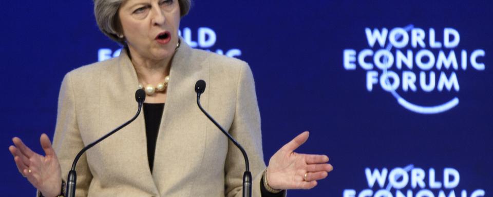 Theresa May est venue à la rencontre de l'économie mondiale à Davos. [Keystone - Laurent Gilliéron]