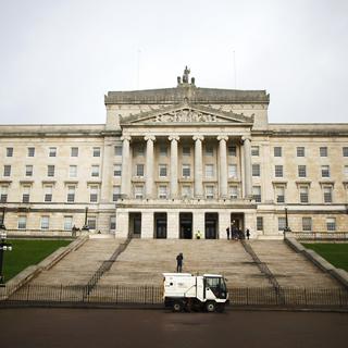 Le palais de Stormont, siège du gouvernement d'Irlande du Nord. [keystone - AP Photo/Peter Morrison, File]