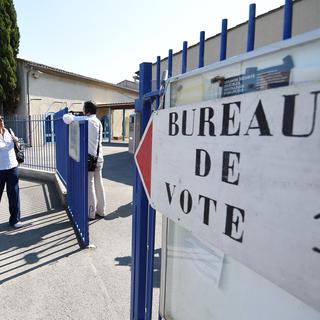 Un bureau de vote dans le Gard, lors du second tour des élections législatives françaises, ce 18 juin 2017. [AFP - SYLVAIN THOMAS]