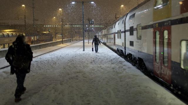 Un quai de gare à Zurich sous la neige (archives). [Keystone - Gaëtan Bally]