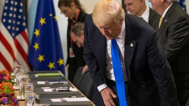 Donald Trump prend place lors du sommet de l'OTAN le 25 mai 2017 à Bruxelles. [AFP - Stéphanie Lecocq]