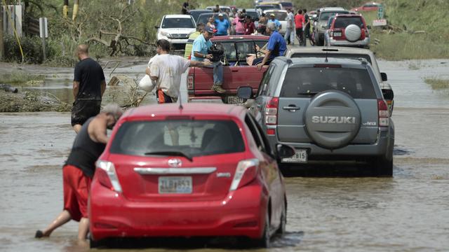 Les zones entourant la rivière Guajataca doivent être évacuées. [Keystone - AP Photo/Carlos Giusti]