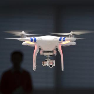22'000 drones seraient déjà en circulation en Suisse. [AP Photo/Kin Cheung]
