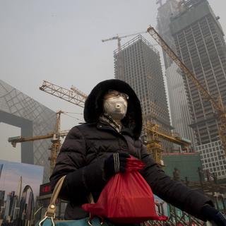 Pékin souffre de la pollution. [keystone - AP Photo/Ng Han Guan]