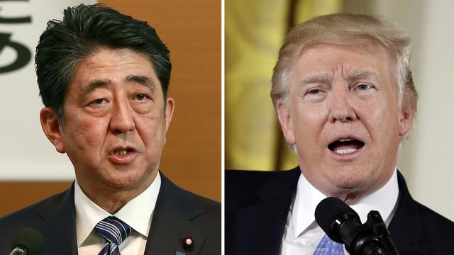 Le Japon inquiet après la guerre des mots entre les Etats-Unis et la Chine. [AP Photo/Keystone - Shizuo Kambayashi/Evan Vucci]