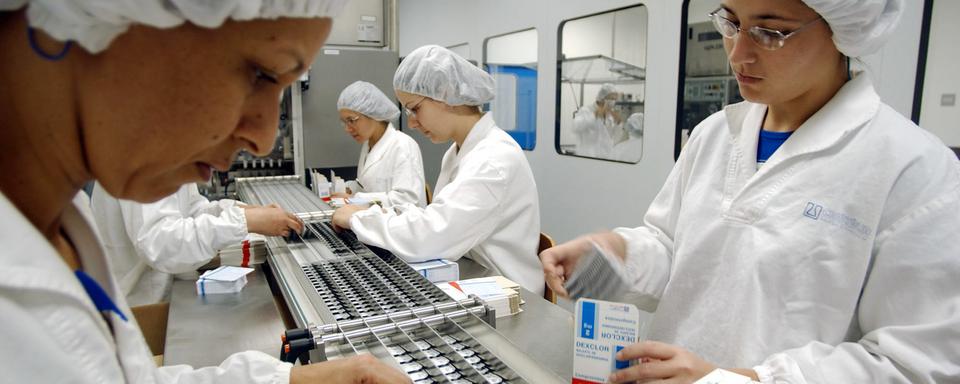 Au Brésil, la production de génériques permet l'accès à des médicaments moins chers. [Keystone - Alexandre Meneghini/ AP Photo]