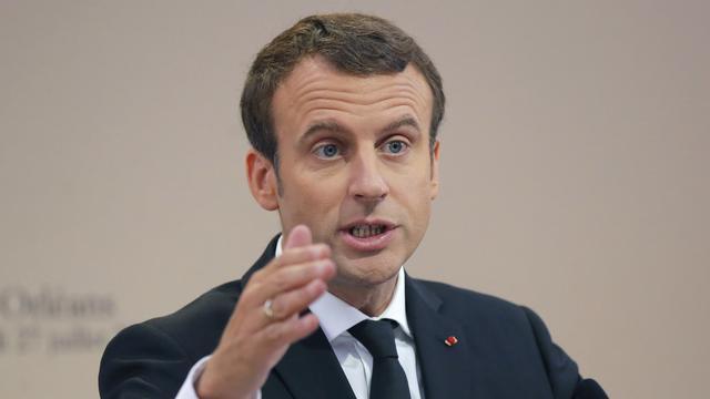 Emmanuel Macron en déplacement en Europe de l'Est. [AP/Keystone - Michel Euler]