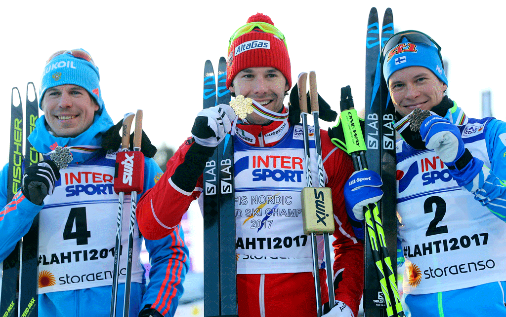 Les trois gagnants du 50km messieurs à Lahti. [Reuters - Kai Pfaffenbach]