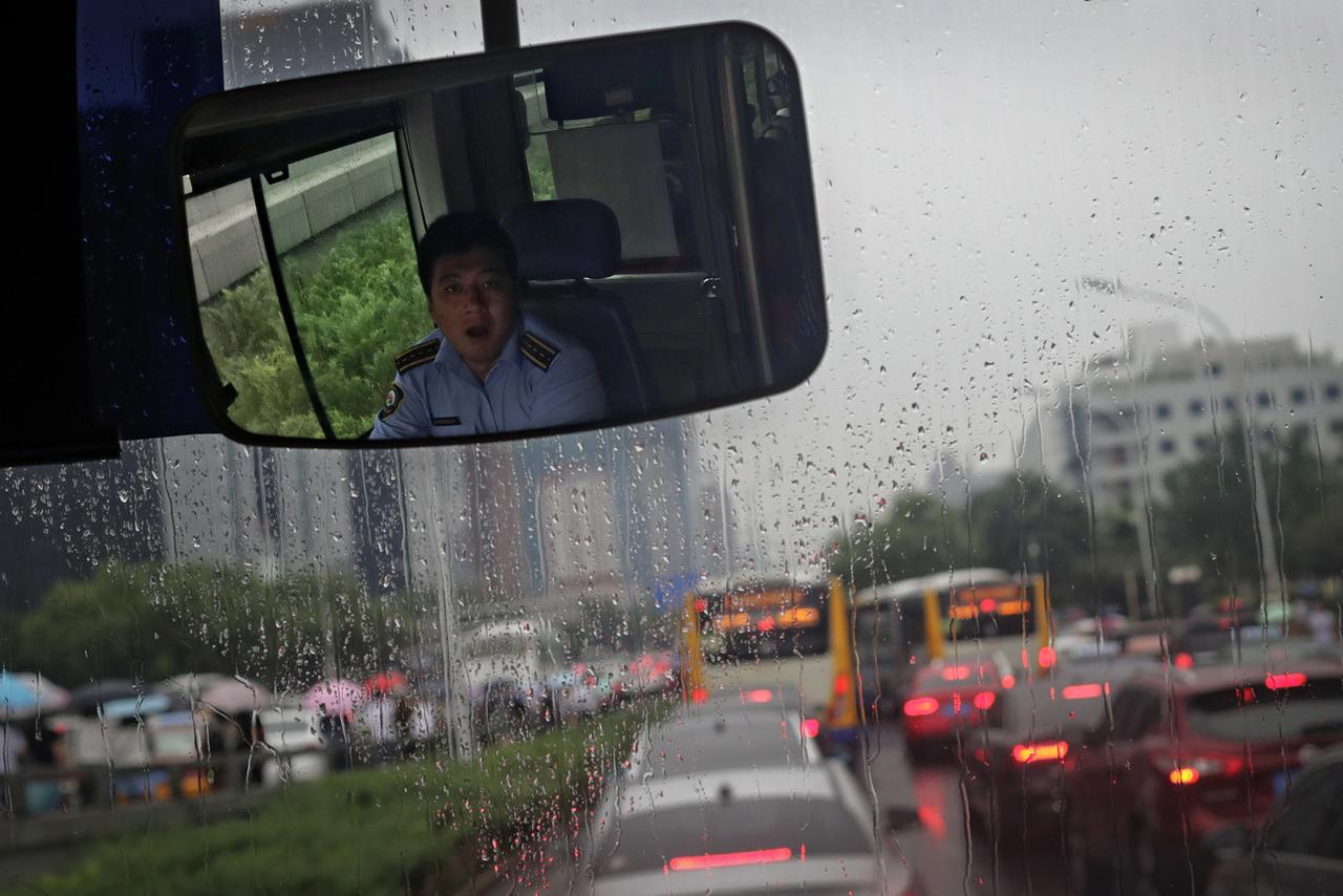 A Pékin, le trafic routier est aussi saturé, les métros bondés. [AP Photo/Keystone - Andy Wong]