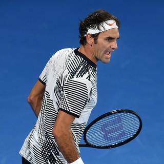 Roger Federer a remporté son match contre le Japonais Kei Nishikori 6-7 6-4 6-1 4-6 6-3. [Keystone - Filip Singer - EPA]