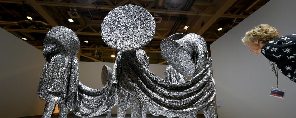 "Speak Louder" de l'artiste américain Nick Cave dans le cadre de Unlimited à Art Basel 2017. [AFP - Fabrice Coffrini]