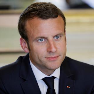 Pas si facile de caricaturer le nouveau président français Emmanuel Macron. [EPA/Keystone - Philippe Wojazer]