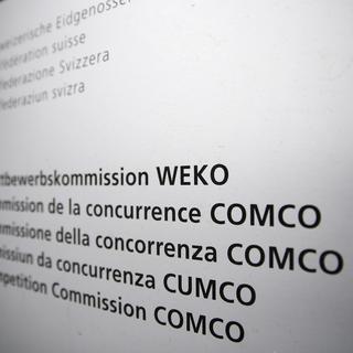 Le logo de la Commission de la concurrence (Comco), à Berne. [Keystone - Peter Klaunzer]