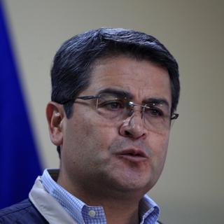 La candidature du président Juan Orlando Hernández était contestée dès le départ par l'opposition. [REUTERS - Jorge Cabrera]