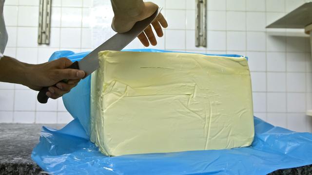 Malgré les apparences, les stocks de beurre fondent en Suisse. [AP Photo/Michel Euler]