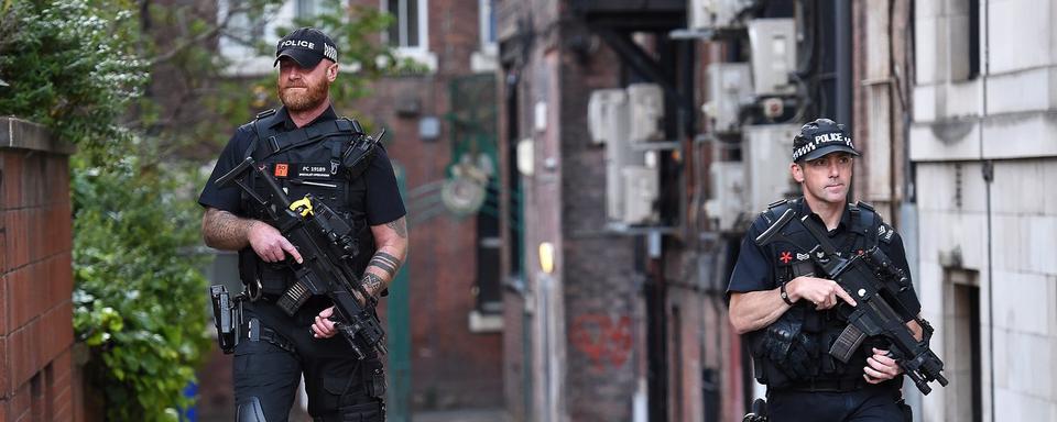 La police quadrille les rues de Manchester. [EPA/Keystone - Andy Rain]