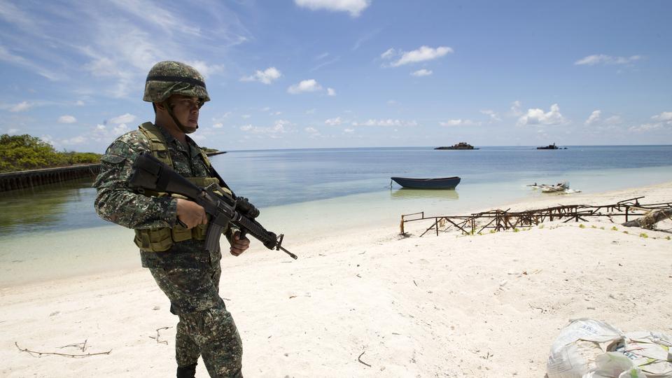 Un soldat philippin sur l'île de Thitu, la plus grande de l'archipel des Spratleys, source rivalités en mer de Chine méridionale. [AFP - Ritchie B. Tongo]