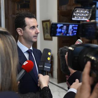 Première depuis la chute d'Alep, le président syrien Bachar al-Assad a répondu à la presse française. [HO / SANA / AFP]