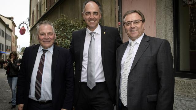 Les candidats PDC Jacques Melly, Christophe Darbellay et Roberto Schmidt. [Keystone - Olivier Maire]