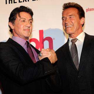 Les acteurs Sylvester Stallone (à gauche) et Arnold Schwarzenegger. [Getty Images North America / AFP - Ethan Miller]