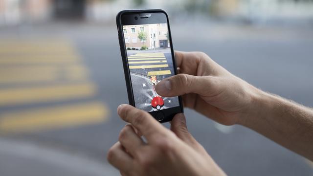 Le jeu Pokémon Go a causé des accidents mortels. [keystone - Gaetan Bally]