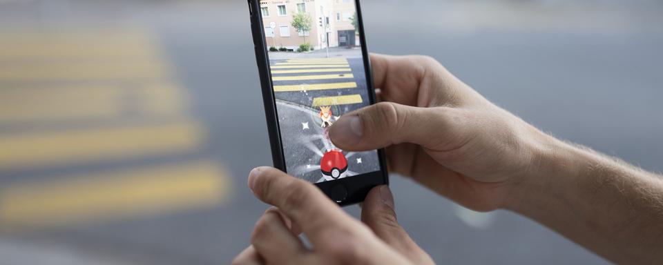 Le jeu Pokémon Go a causé des accidents mortels. [keystone - Gaetan Bally]