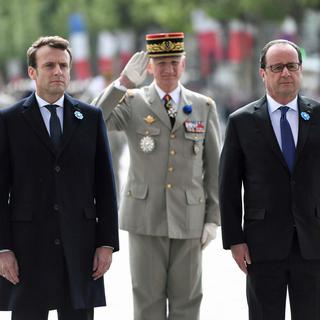 Les deux présidents lors de la cérémonie du 8 mai à Paris. [Pool/AFP - Stéphane de Sakutin]