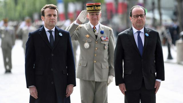 Les deux présidents lors de la cérémonie du 8 mai à Paris. [Pool/AFP - Stéphane de Sakutin]