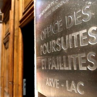 L'entrée de l'Office des poursuites et faillites Arve-Lac à Genève. [Keystone - Laurent Gilliéron]