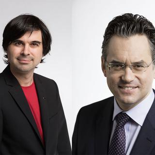 Les conseillers nationaux Samuel Bendahan (PS/VD) et Olivier Feller (PLR/VD). [Keystone - Christian Beutler]