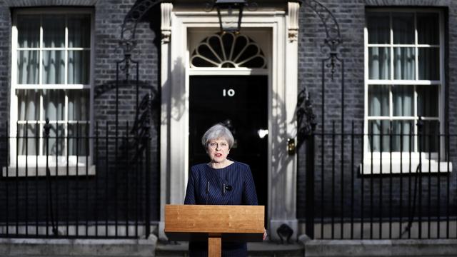 Theresa May, devant 10 Downing Street, d'où elle a fait son annonce. [Stefan Wermuth]