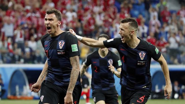 Mandzukic a bénéficié d'un petit coup de pouce pour tromper le portier danois à bout portant. [Franck Robichon]