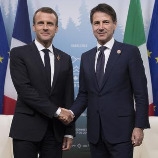 Emmanuel Macron et Giuseppe Conte lors du sommet du G7 au Canada, début juin. [Keystone - EPA/Ian Langsdon/pool Maxppp]
