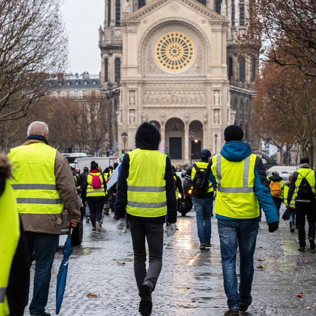 Des gilets jaunes à Paris le 1er décembre. [AFP - Karine Pierre/Hans Lucas]