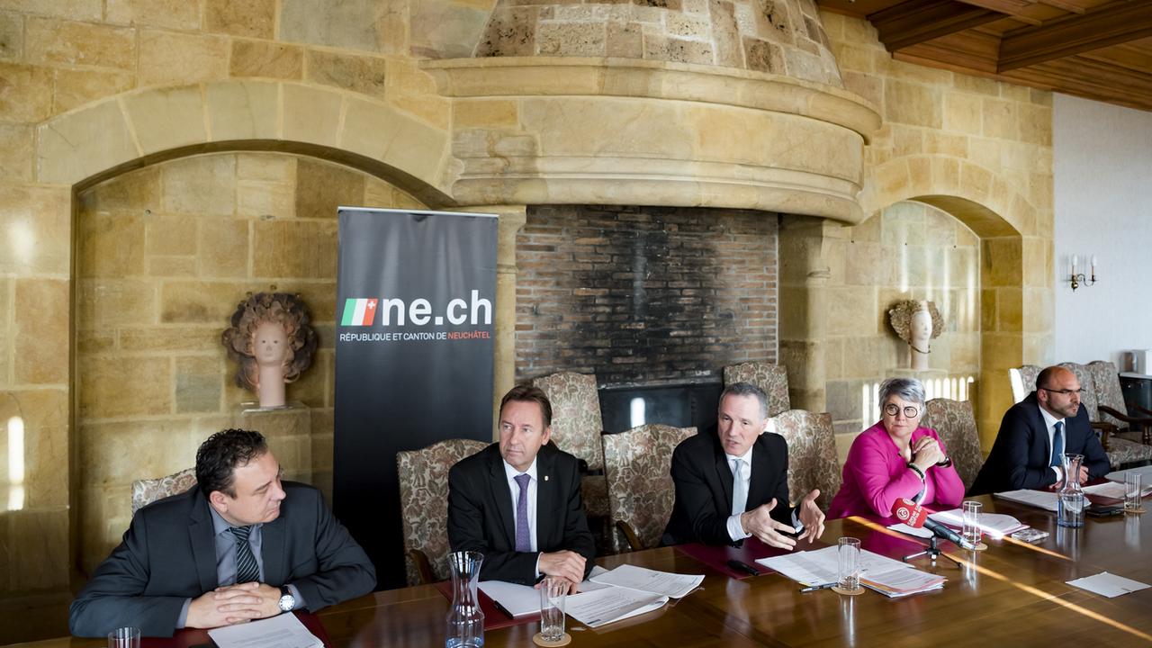 Le Conseil d'Etat de Neuchâtel a présenté in corpore le programme d'impulsion et de transformations. [Keystone - Jean-Christophe Bott]
