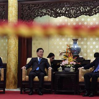 Le ministre coréen de la sécurité nationale et le ministre chinois des Affaires étrangers se sont rencontrés le 12 mars 2018 à Pékin. [Keystone - Kenzaburo Fukuhara]