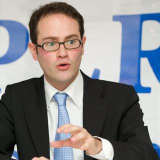 Mathieu Blanc, avocat de l'Association de communes de la région lausannoise pour la réglementation des taxis. [Keystone - Jean Christophe Bott]